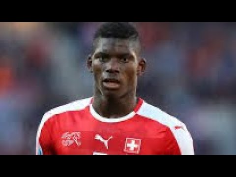 Breel Embolo scored for Switzerland against Cameroon.  Can he ever go back home?