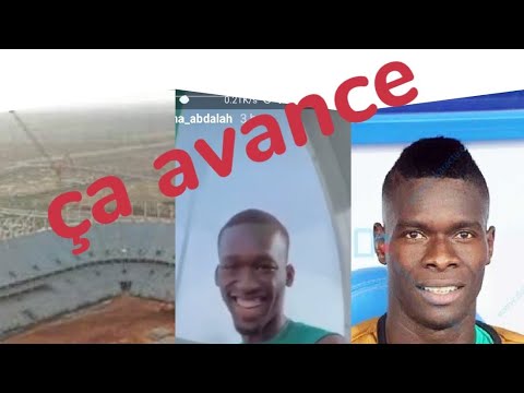 Abdallah Sima et Pape Abou Cissé rigolent,  stade Diamniadio ça avance très bien
