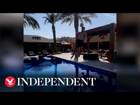 Declan Rice and Jack Grealish play 'keep it up' over swimming pool on World Cup day off