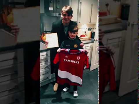 Middlesbrough FC midfielder Marten De Roon suprises young Boro fan Henry