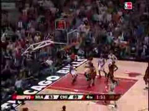 Luol Deng drives hard for an And-1 play