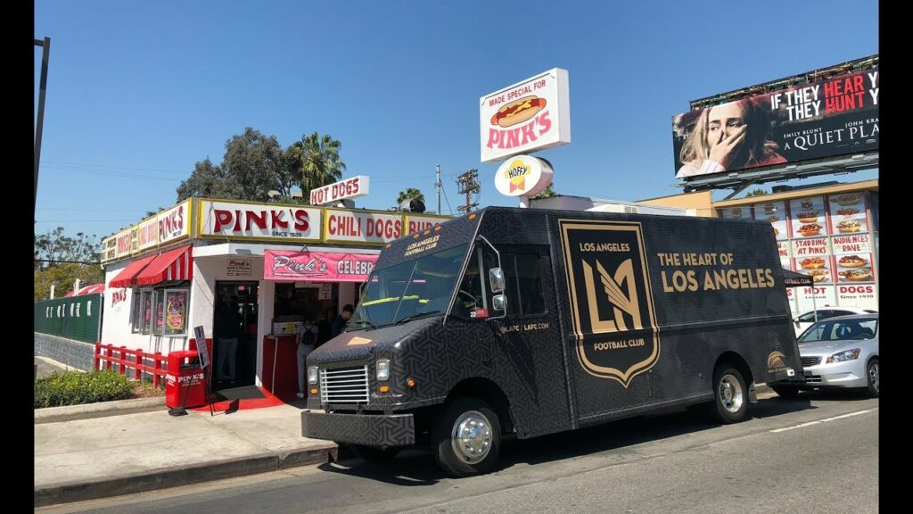 Walker Zimmerman and Max Bretos hopped behind the counter at Pink's Hot Dogs to make the "LAFC Dog."