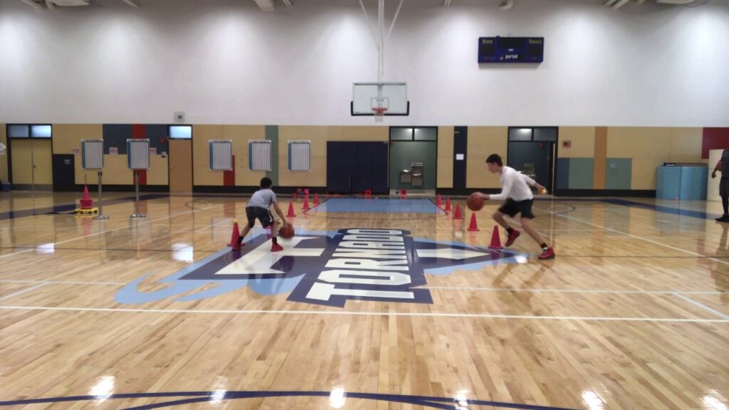 5th Grader Ethan Horvath and 6th Grader Logan Horvath wth Basketball Addict's Dwayne Bryant