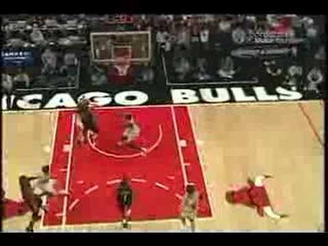 Luol Deng blocks a shot