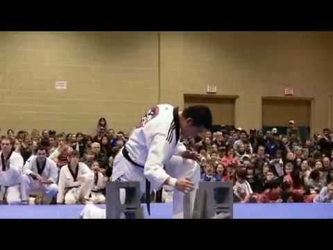 Master Jung Hwan Kim breaks 8 slabs of marble