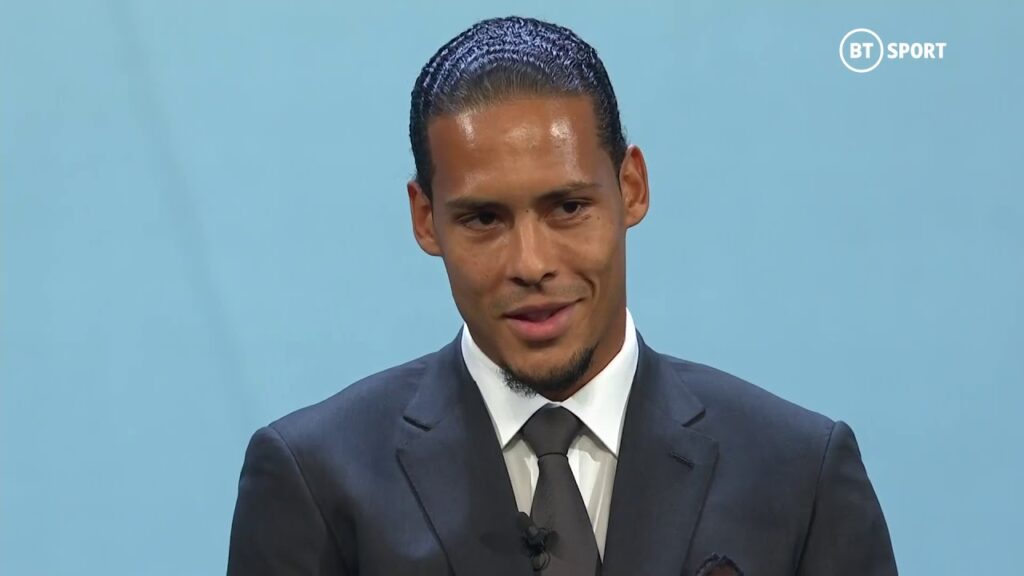 Virgil van Dijk accepts the UEFA Men's Player of the Season award for 2018/19
