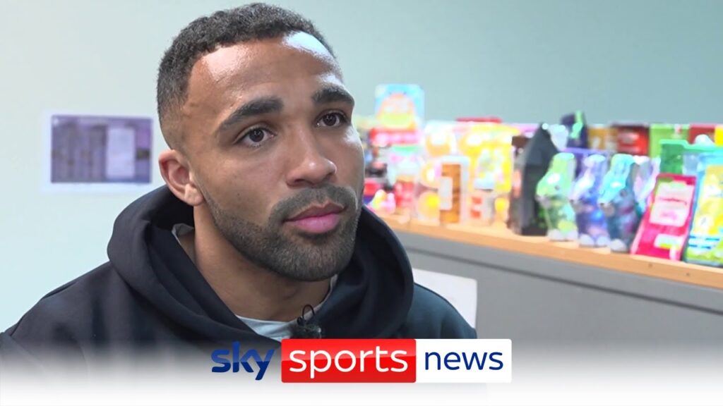 Callum Wilson helps out at a foodbank after using them as a child