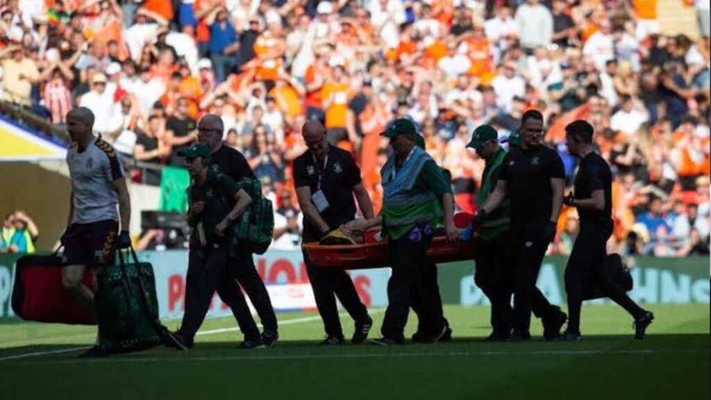 Luton Town captain Tom Lockyer collapses on pitch & taken to hospital