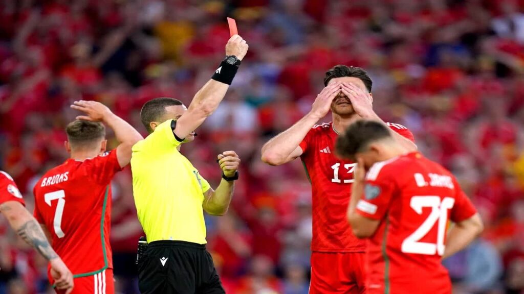 Wales fans demand Moore make way for Wrexham star as striker gets sent off