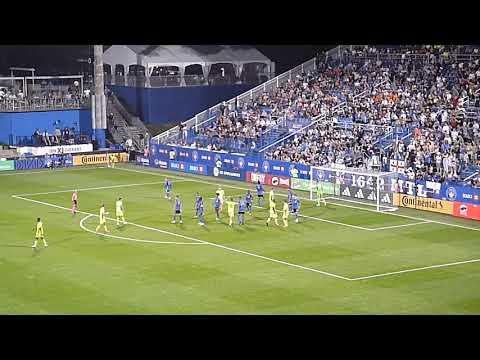 Jonathan Sirois of CF Montreal (Impact) stops Walker Zimmerman of Nashville SC 6/21/23