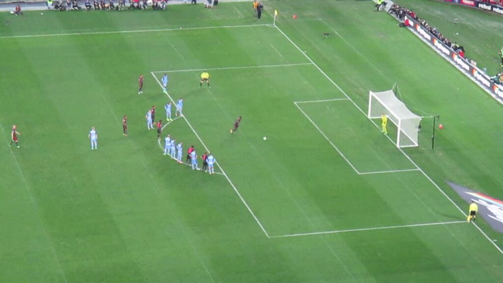 Sydney FC goalkeeper Andrew Redmayne (Bluemayne) saves penalty vs Arsenal's Danny Welbeck