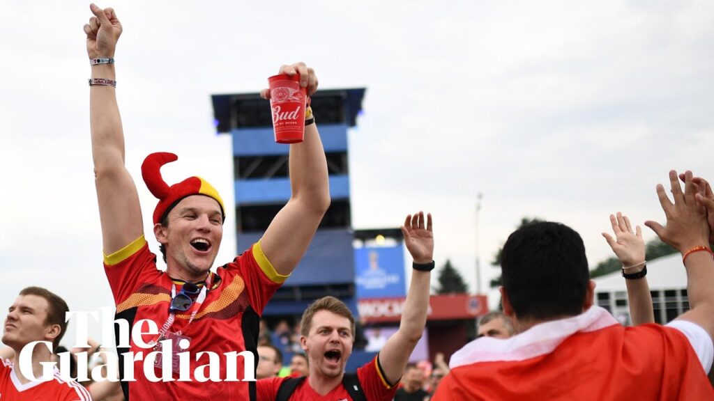 Belgium fans celebrate Thomas Meunier's early goal against England