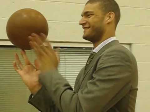 Brooke Lopez spins a basketball