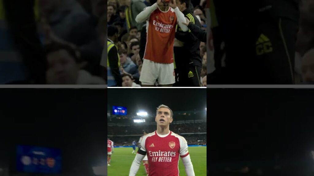 Mikel Arteta and the Arsenal bench react to Leandro Trossard's equaliser against Chelsea