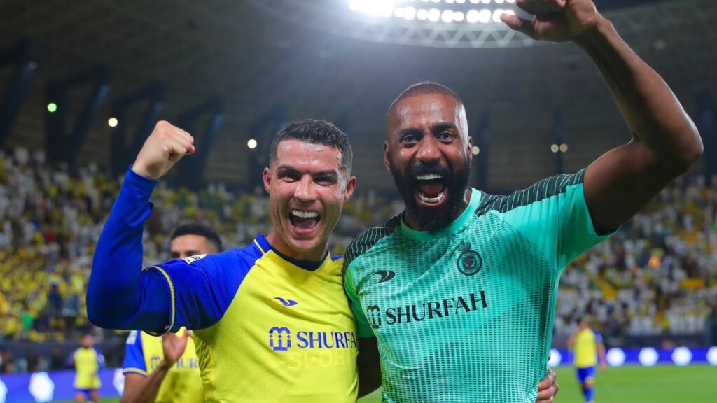 Cristiano Ronaldo and Al Nassr goalkeeper Waleed Abdulla after the game