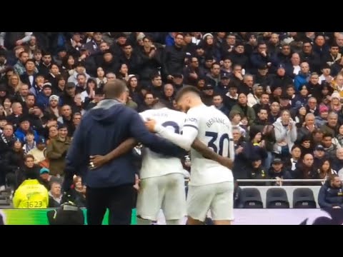 Spurs players consoling Pape Matar Sarr after getting injured