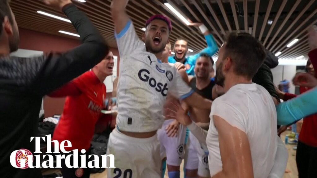 Girona players celebrate after stunning Barcelona to go top of La Liga
