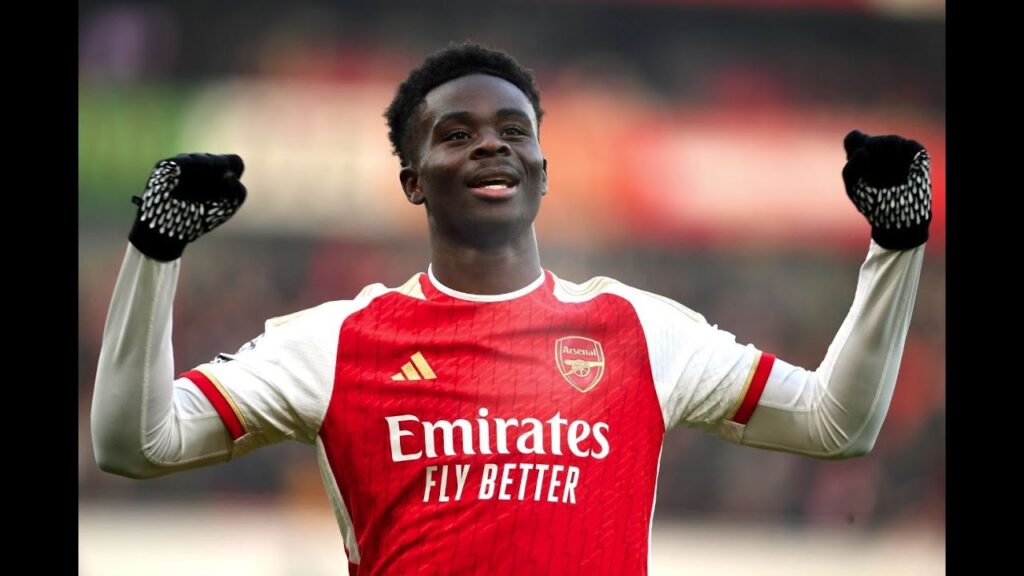 Arsenal fans celebrate Bukayo Saka's goal against Liverpool February 4 2024 at the Emirates Stadium.