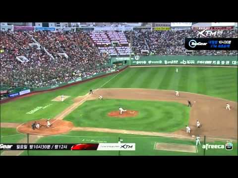 LG's Kim Il-gyung with the take-out slide of Lotte's Moon Kyu-hyun