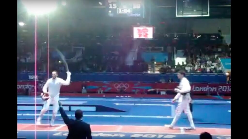 London 2012 Olympics - Fencing Men's Foil - Andrea Cassara vs Alaaeldin Abouelkassem - Final Touch