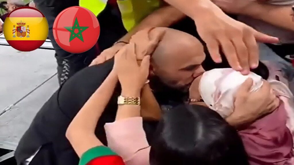 Walid Regragui goes up to the stands in order to kiss his mother who attended Morocco against Spain