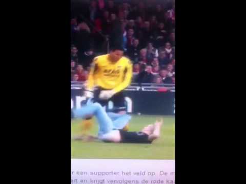 Dutch goalie Esteban kicks Ajax supporter after being atacked. Close up of the kick.