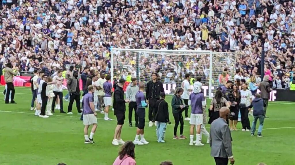 LAP OF APPRECIATION: The Tottenham Players After the Game: Spurs Staff With Their Friends and Family