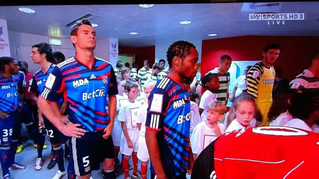 Cameron player escort Dejan Lovren Emirates Cup 2010