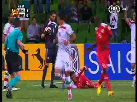 Alireza Haghighi uses grubby tactics and plows into Faouzi Aaish Iran Vs Bahrain