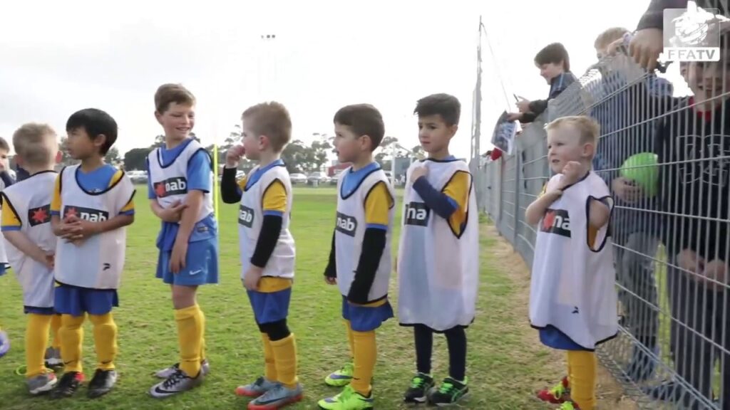 Socceroos stars give coaching tips to Williamstown Soccer Club.