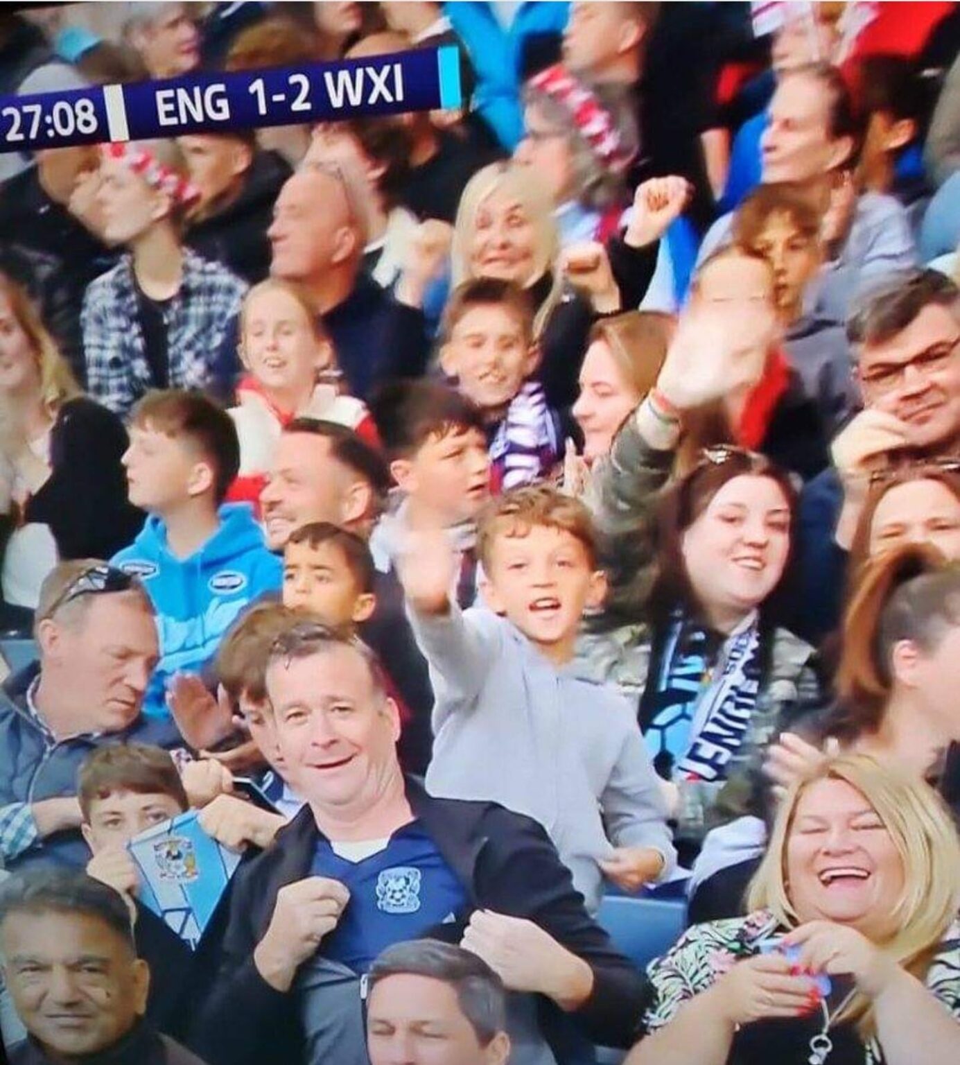 Rival fan in the crowd vs World XI