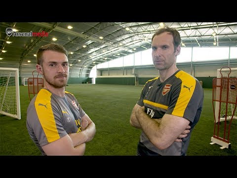 Petr Cech challenges Aaron Ramsey to a game of Heads Up!