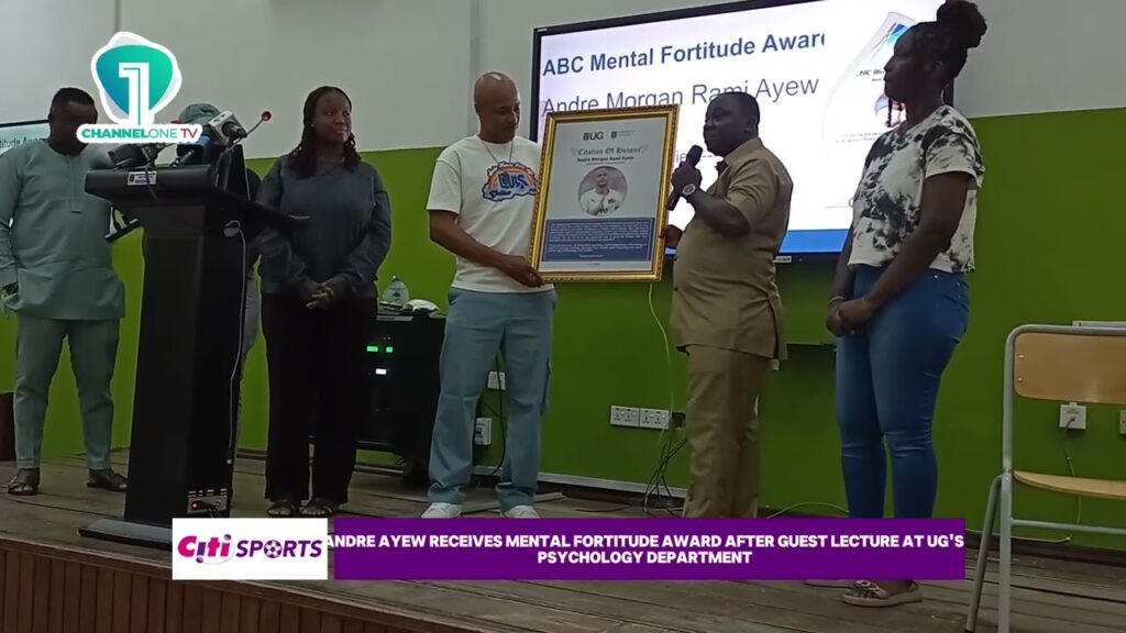 Andre Ayew receives Mental Fortitude award after his guest lecture at UG's Department of Psychology.