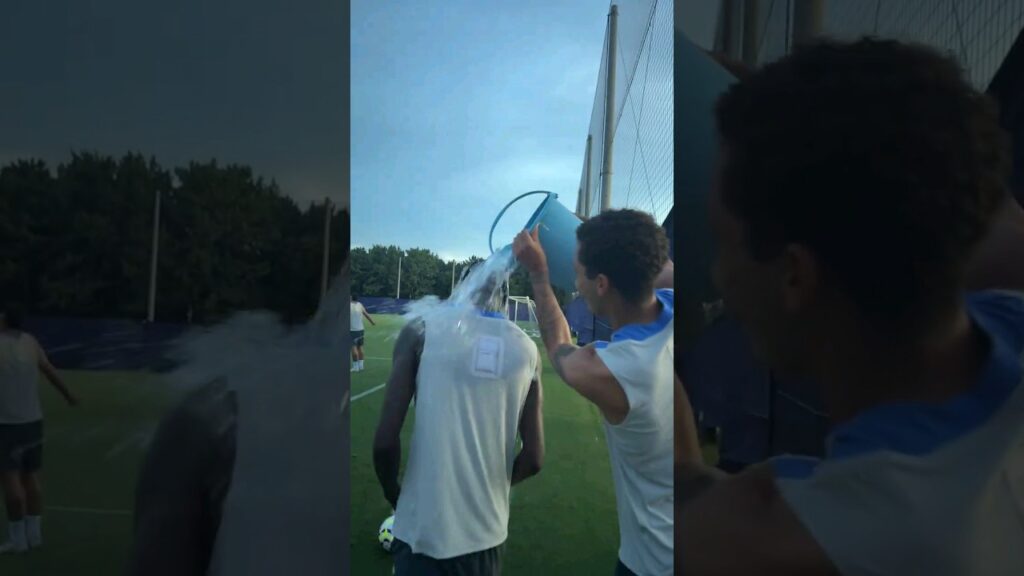 BRENNAN JOHNSON AND PAPE MATAR SARR: Johnson Pours a Bucket of Water Over Sarr, in Tokyo, Japan