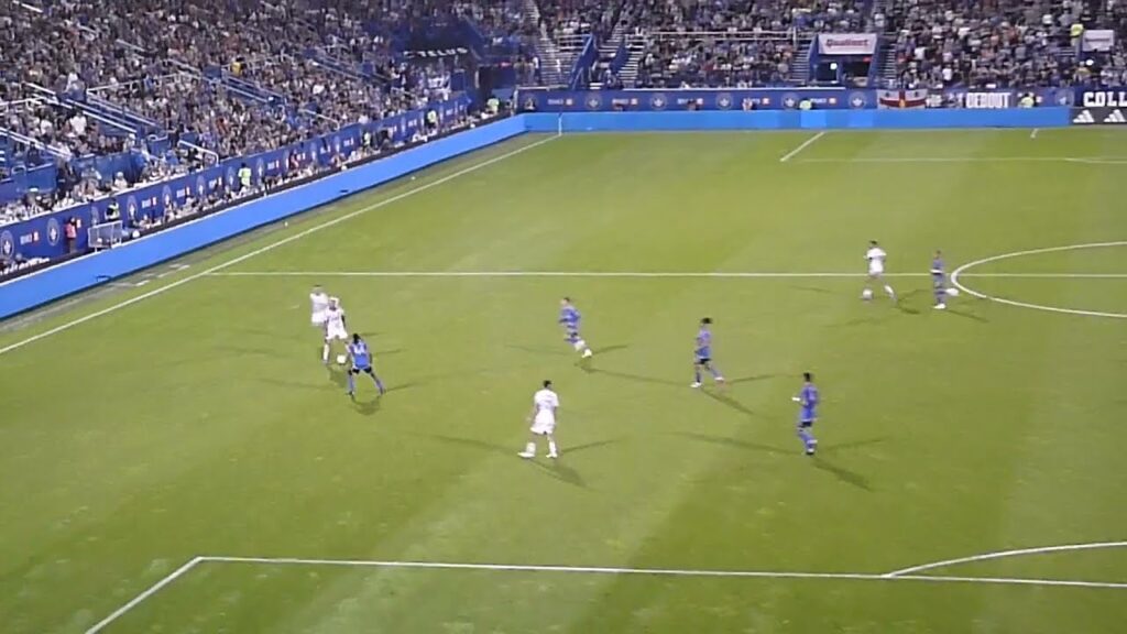 Jonathan Sirois of CF Montreal (Impact) stops Jonathan Osorio of Toronto FC 7/20/24