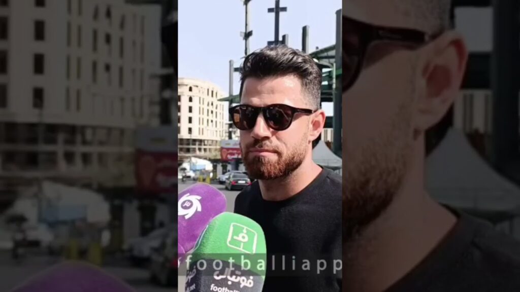 مرتضی پورعلی گنجی در حال فرار از دست مردم و طرفداران