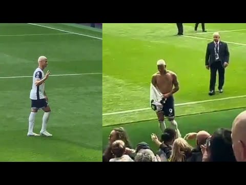 Richarlison Applauding The Everton Fans As He Gives His Tottenham Shirt To One Of Them.