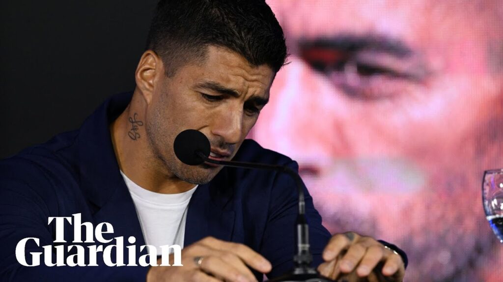 Luis Suárez holds back tears as he announces retirement from international career