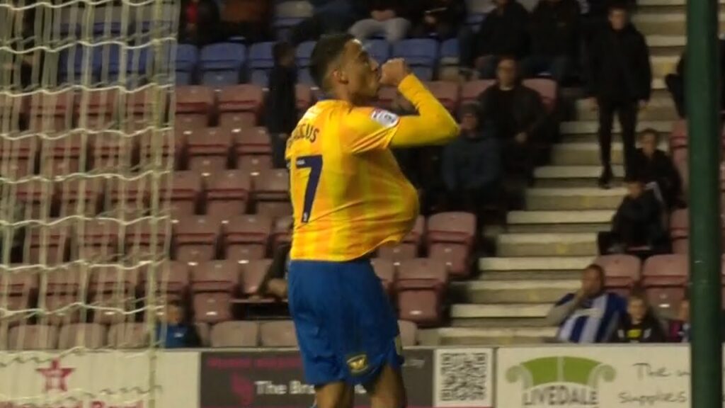 Keanu Baccus scores the second goal v Wigan