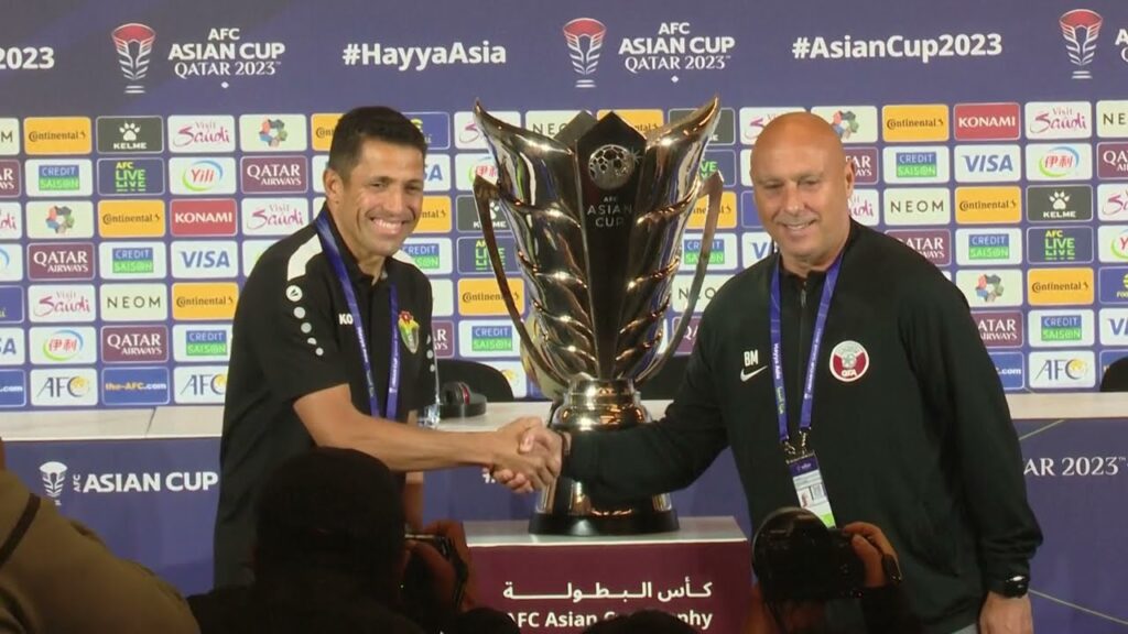 Rival coaches pose with the new AFC Asian Cup trophy ahead of the final