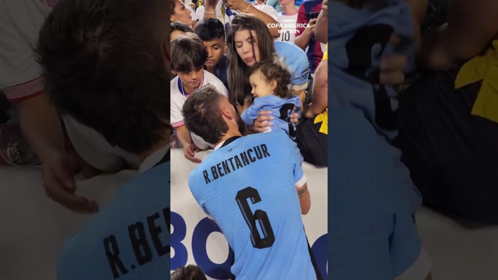 Rodrigo Bentancur with his wife and child after Uruguay beat the United States in the Copa America