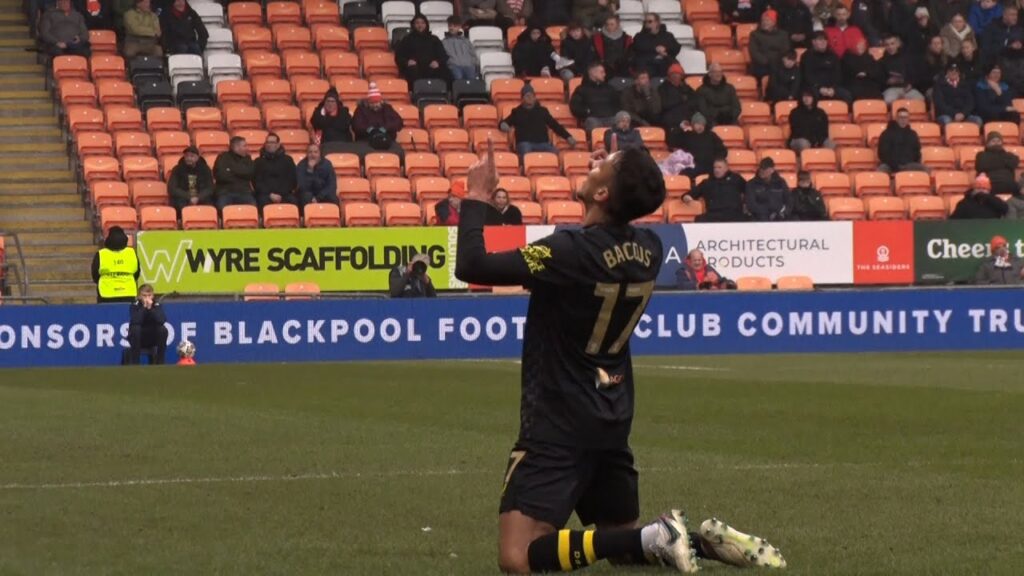 Pitchside angle: Keanu Baccus scores the second goal v Blackpool