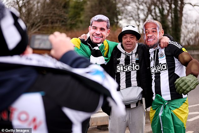 Others pulled on masks of their favourite players, including Bruno Guimaraes and Joelinton