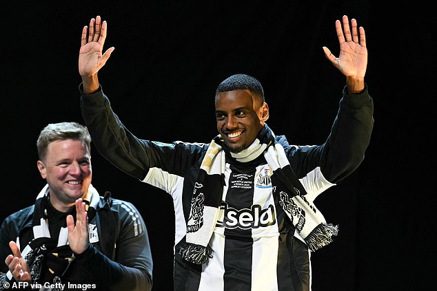 Alexander Isak, the scorer of the second goal in the final against Liverpool, waves to an adoring crowd as he is applauded by Newcastle boss Eddie Howe