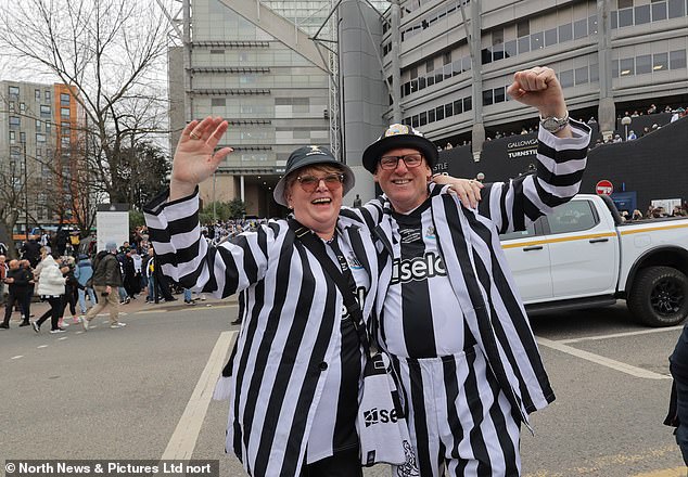 Supporters congregate outside St James' Park, ahead of Newcastle United's Carabao Cup trophy parade through the streets of Newcastle