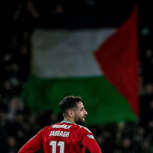 Oday Dabbagh posts himself in front of the GB’s Palestine flag