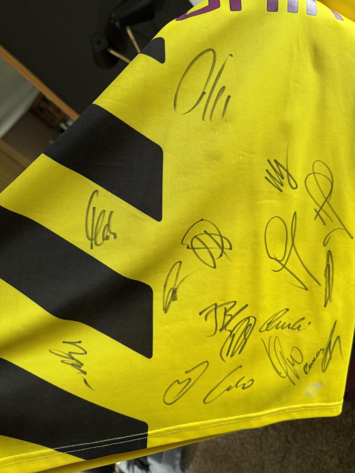 Can anyone identify the signatures on this 14/15 shirt?