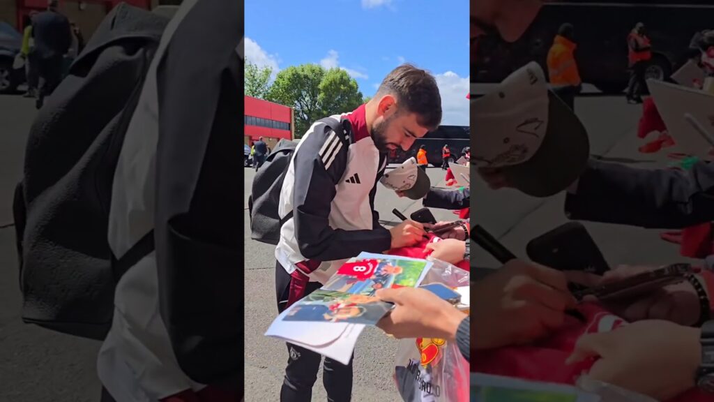 Bruno Fernandes with fans outside Old Trafford ahead of Aston Villa
