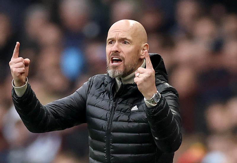 Erik ten Hag gestures to his players from the touchline