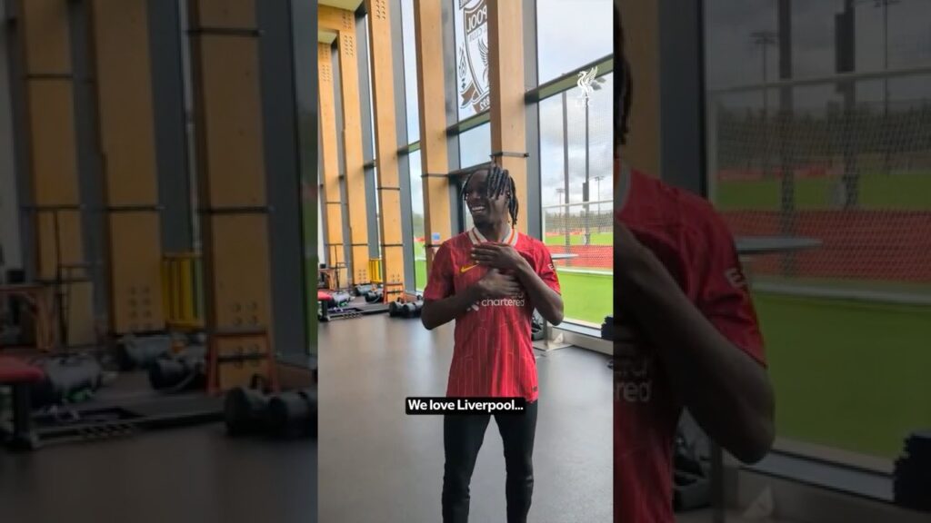 Jeremie puts on the shirt for the first time